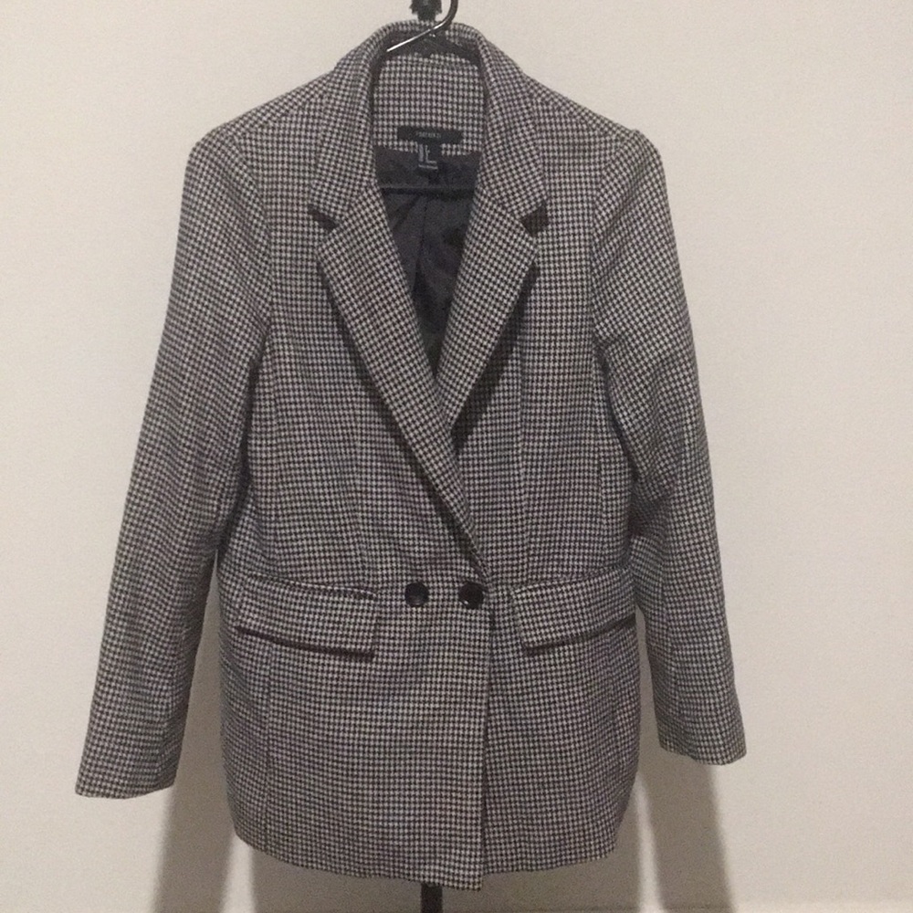Black and white jacket, used, small.